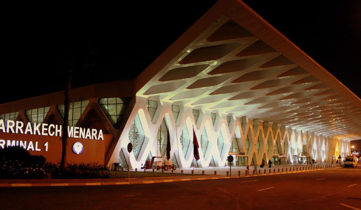 Business traveler arriving at international airport for private chauffeur transfer